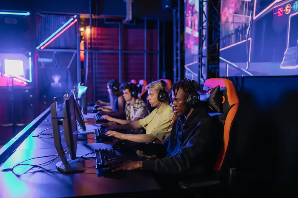Screenshot of vibrant characters battling in a neon arena